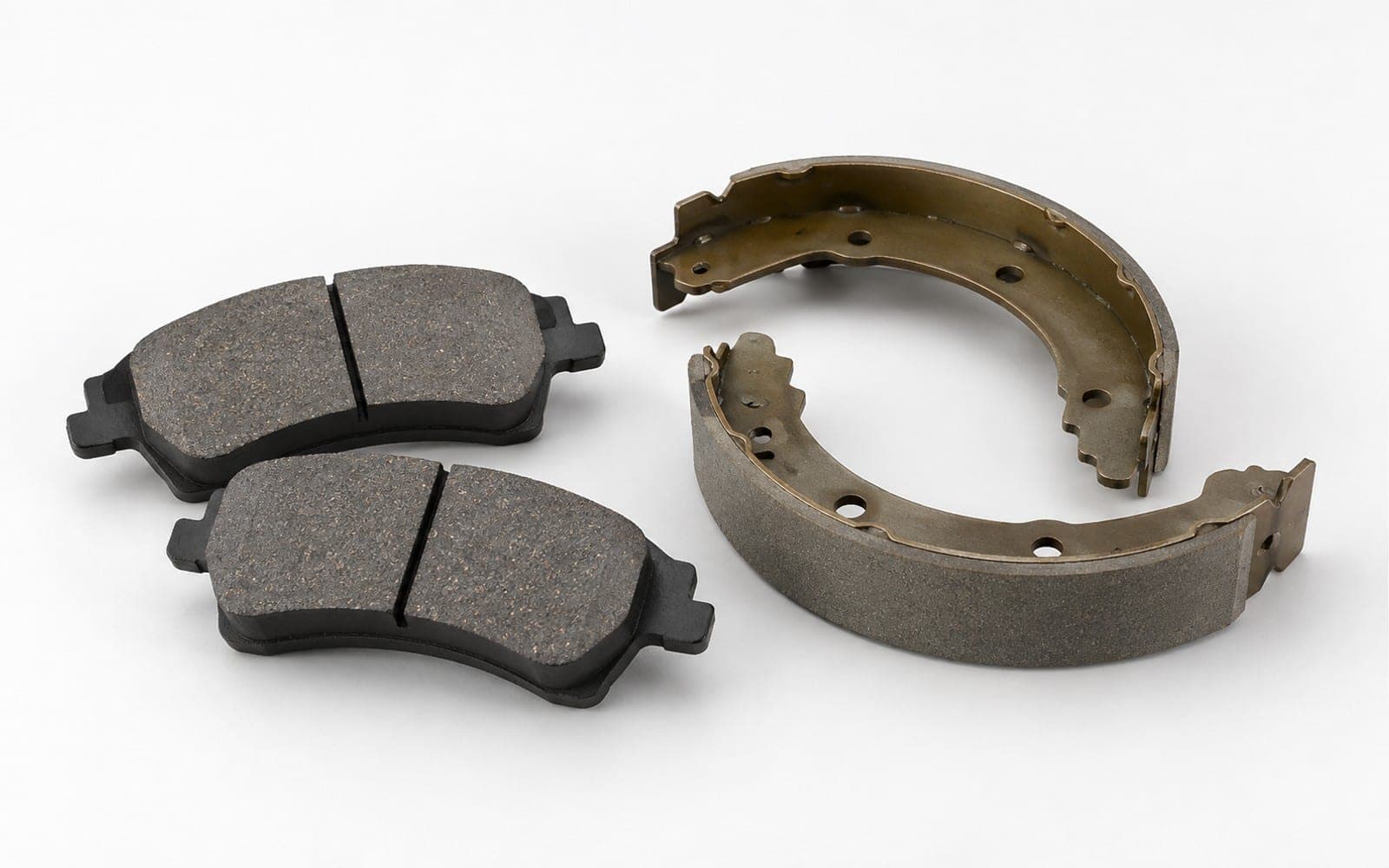 AI-generated example of disc brake pads and curved drum brake shoes.