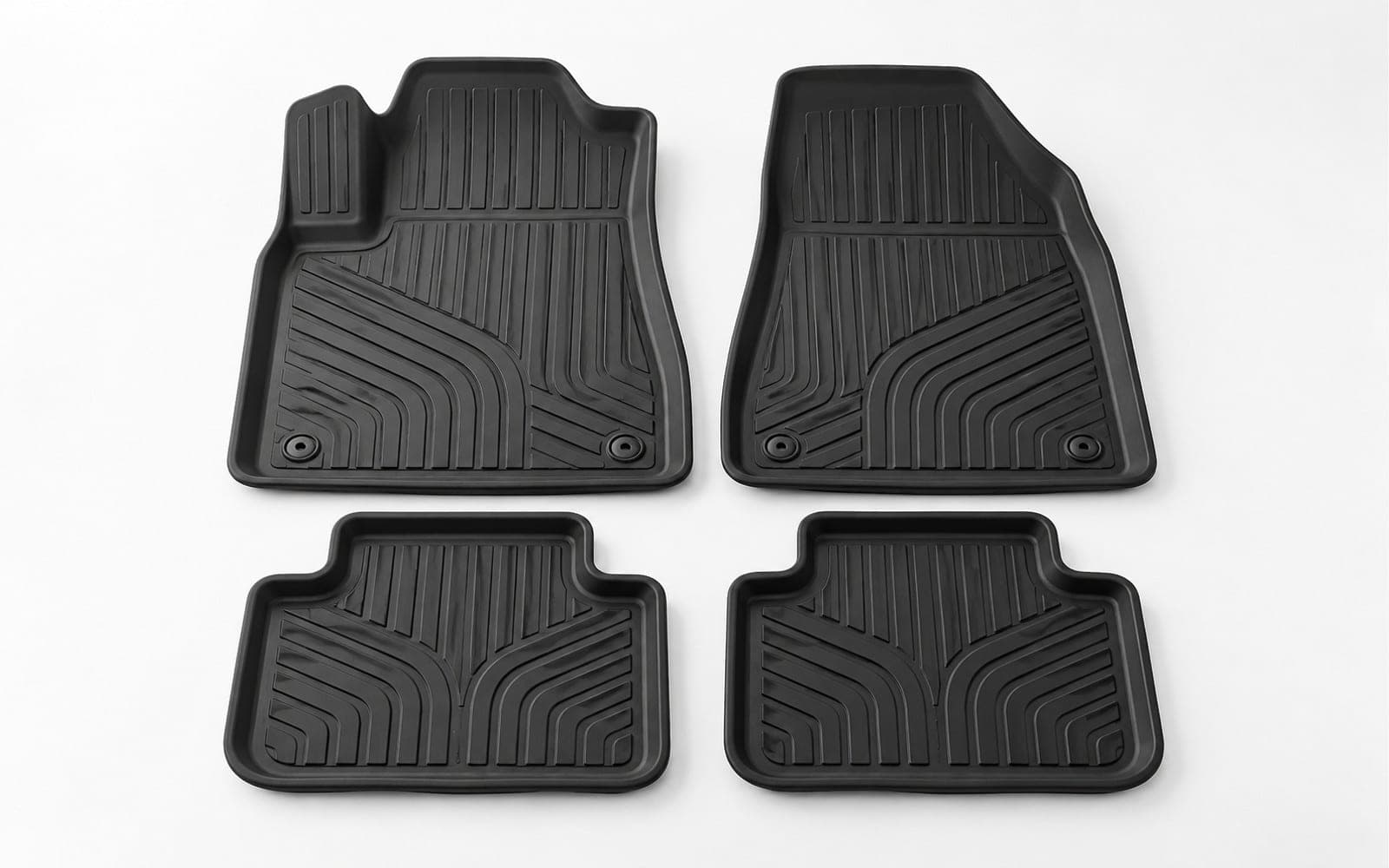 AI-generated example of four moulded rubber car floor mats.