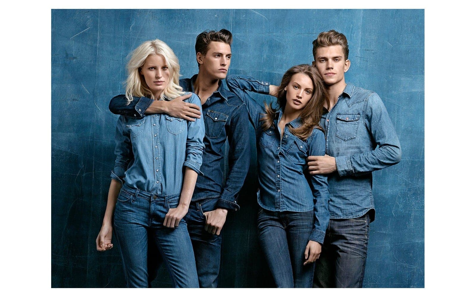 Models wearing blue denim shirts and jeans.